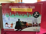 Atlasonix Animated Christmas Train Set Smoke, Light, Action, Choo Sound Toy. Fixed Price $35.00.