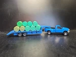 Ertl 1/64 Ford F-350 Dually Pickup Blue Gooseneck Flatbed Trailer Round Hay Bale. Fixed Price $39.97.