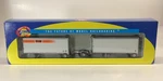 Ho Scale Athearn 28 Wedge Trailers & Dolly Yellow - New In Box Nib. Fixed Price $52.98.