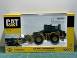 Vintage Nib Norscot 55026 Cat 980G Forest Machine Loader 1:50 Scale. Fixed Price $49.99.