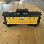 Lionel No. 6437-6 Up Union Pacific Yellow Porthole Illuminated Caboose 9168. Fixed Price $19.00.