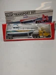 Vintage 1984 Intex Corporation 2 Piece Set Power Transport Motorize Die Cast. Fixed Price $17.99.