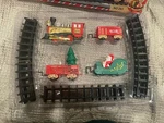 Christmas Train Set Battery-powered Holiday With Lights & Sounds. Fixed Price $21.97.