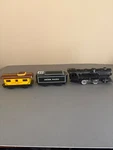 1950'S Marx Locomotive With Union Pacific Tender & Passenger Car. Fixed Price $45.00.