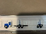 Scale Trainworx 47984 Peterbilt 379 Log Truck Blue. Fixed Price $43.96.