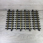 Vintage Set Of New Bright Brass Colored Straight Tracks 473T-2. Fixed Price $29.99.