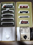 Aurora Postage Stamp Trains Canadian National 4701-211 Set Complete. Fixed Price $545.85.
