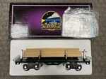 + Mth Standard Gauge Tinplate Dark Green 511 Flat Car W/ Wood Load 10-1117. Fixed Price $180.00.