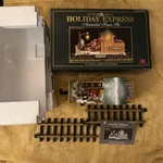 New Bright Holiday Express Animated Christmas Train Set Log Mill Wood Car 380-4. Fixed Price $54.99.